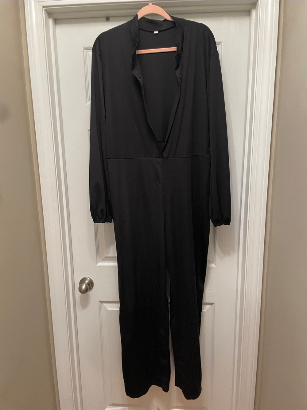 Black Long-Sleeve V-Neck Jumpsuit button closure